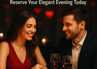 Candlelit dinner table set for two with wine glasses, surrounded by soft, romantic lighting.